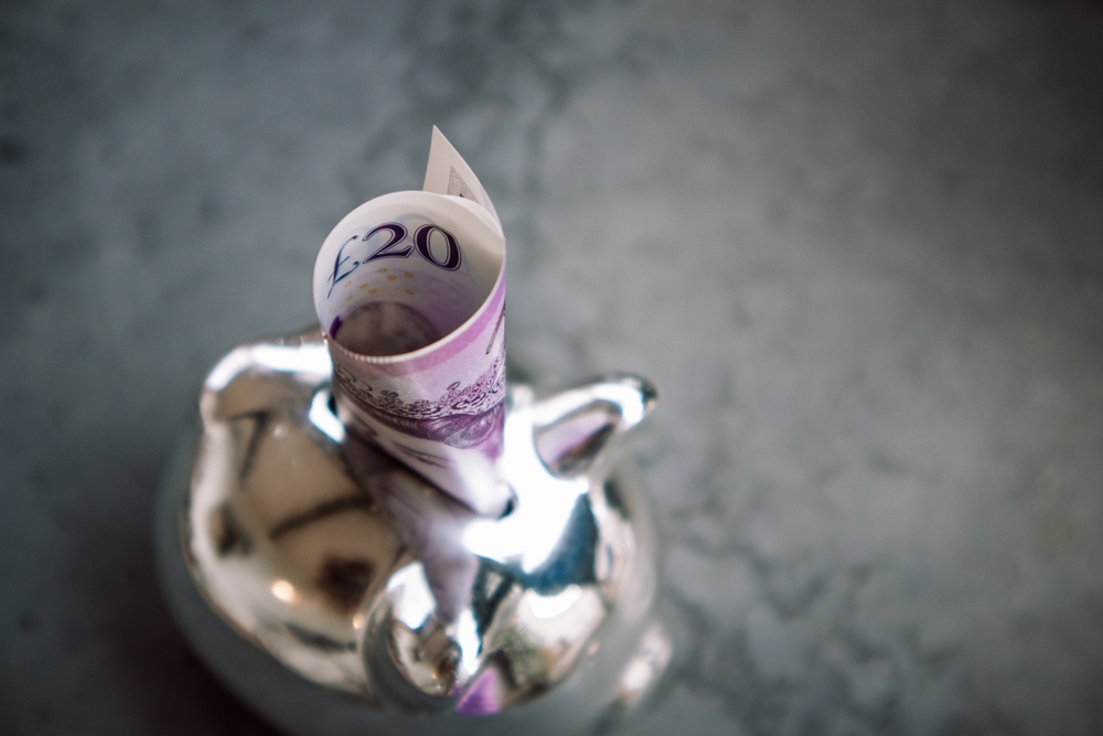 an image of bank notes to denote a story about whether to switch savings