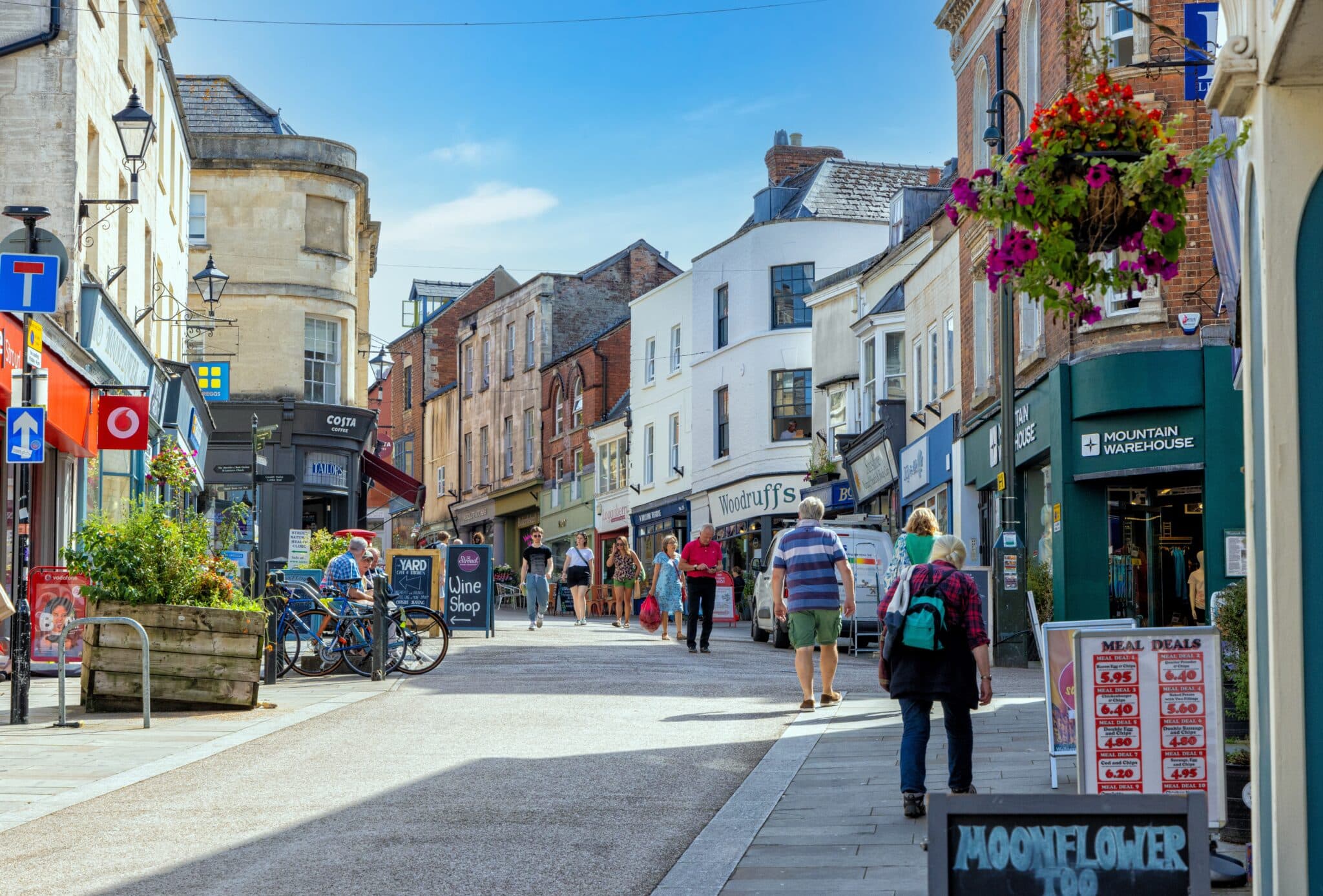 photo of a sunny high street to denote retail sales improving in May
