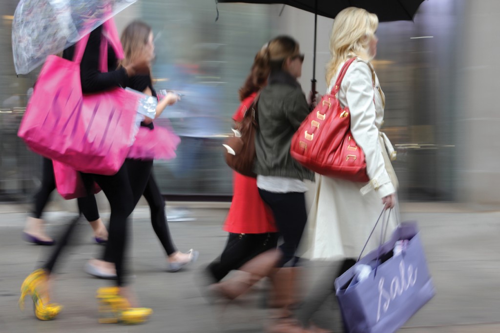Shoppers spent less as wet weather rained on retail sales